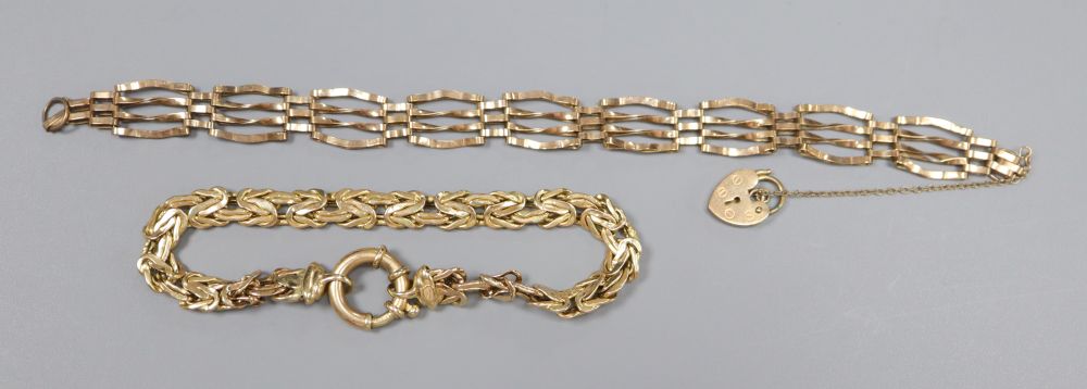An Italian 14k fancy link bracelet(a.f.) 16.5cm and a 9ct gold gatelink bracelet with padlock clasp, gross 15.5g.